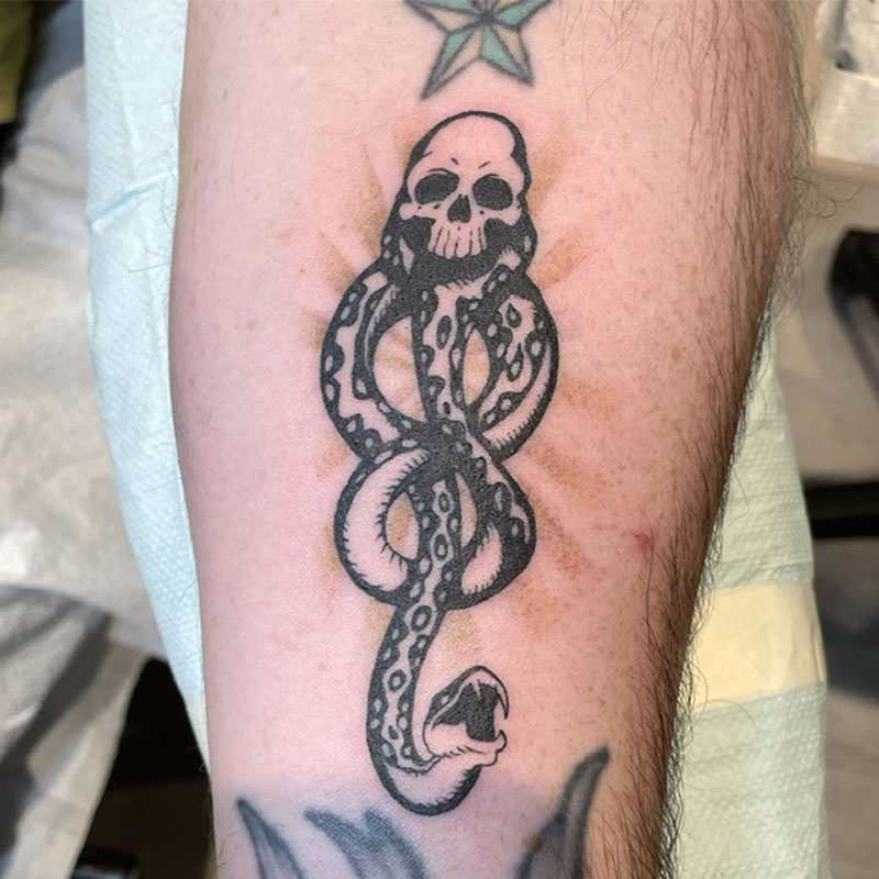 Skull, Harry Potter, Blackwork tattoo by Scott “Cool-Aid” Irwin
